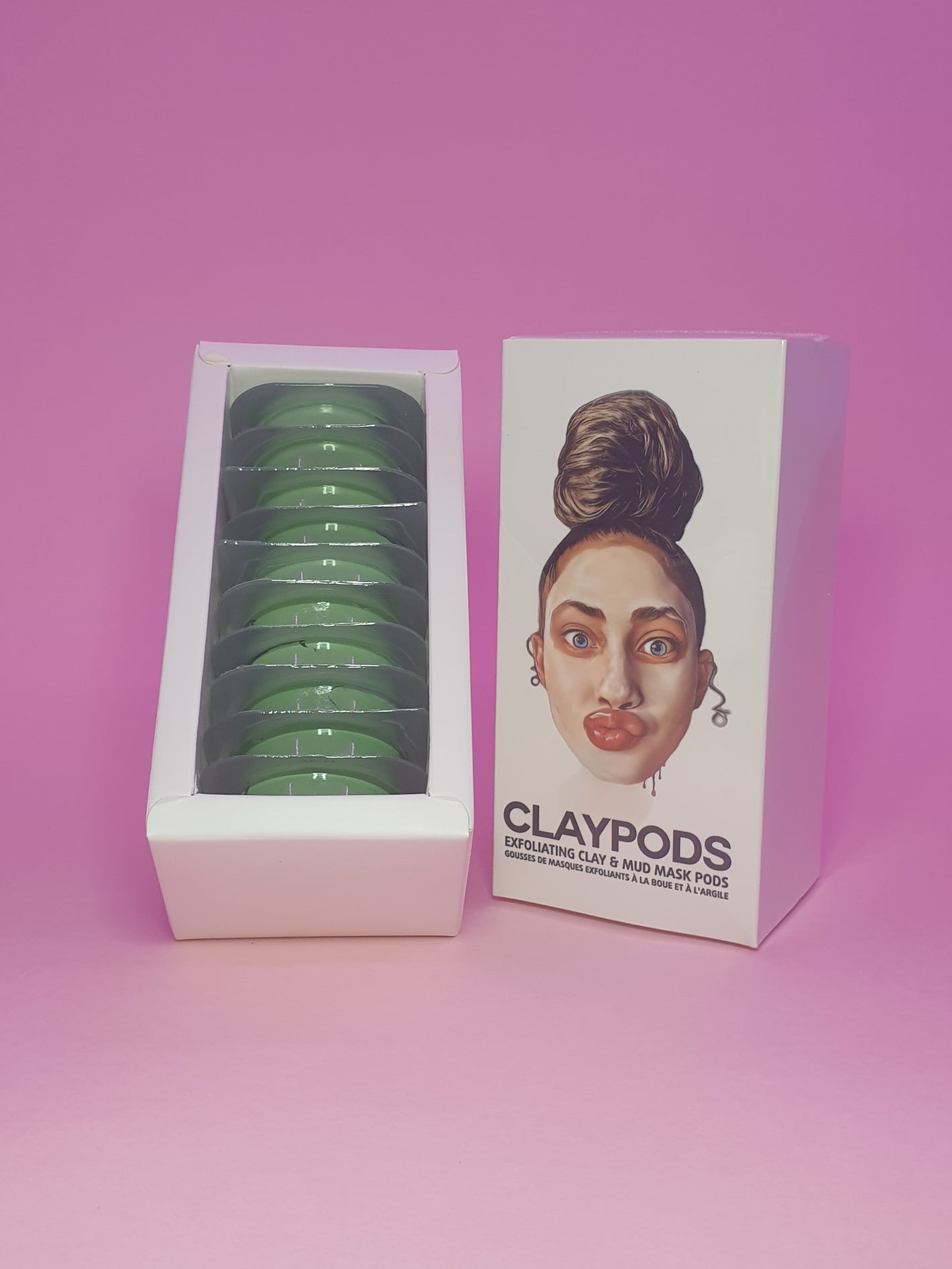 Green Tea clay pod mud mask product shot on purple background