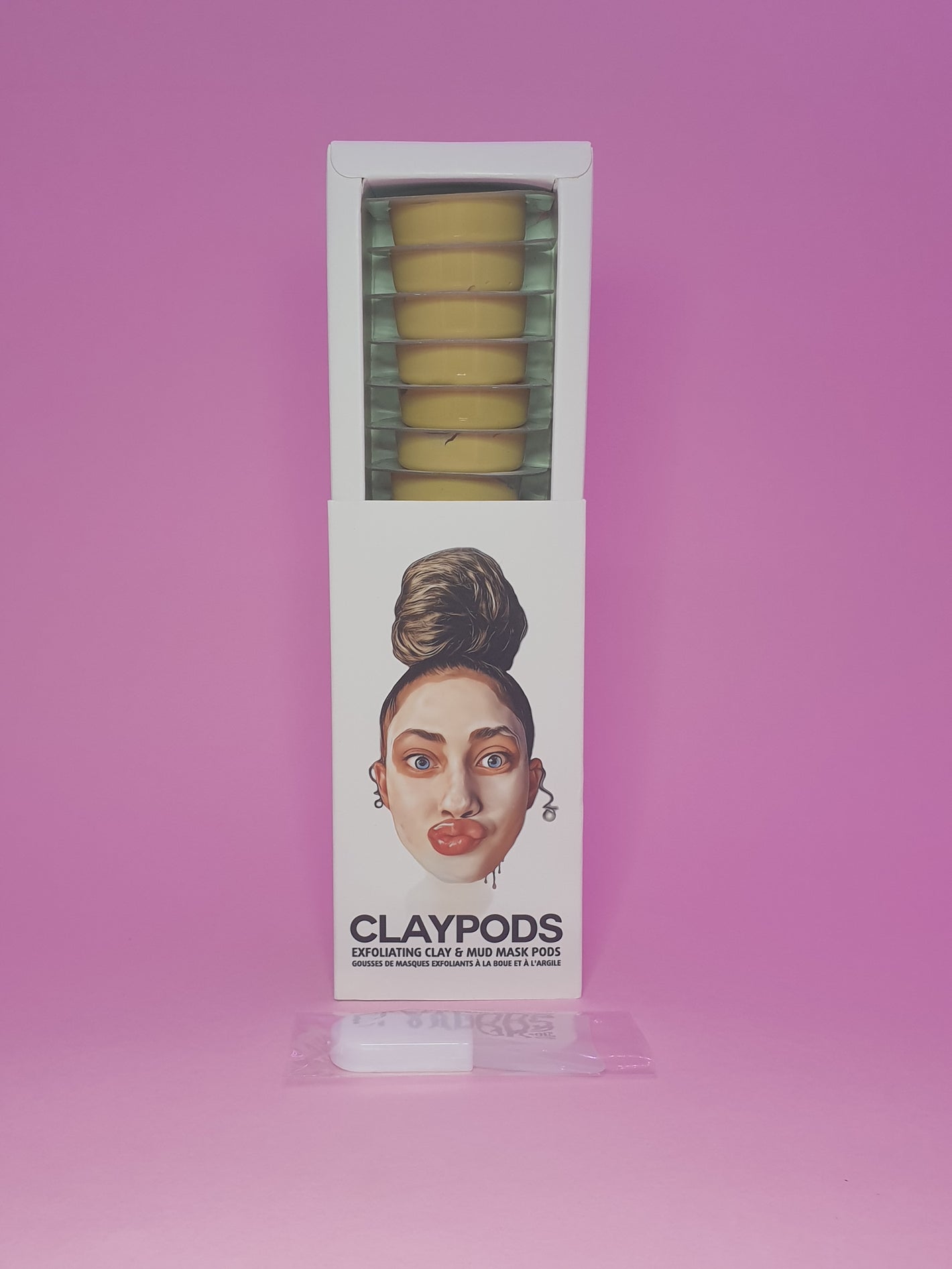 turmeric clay pods with mud mask brush