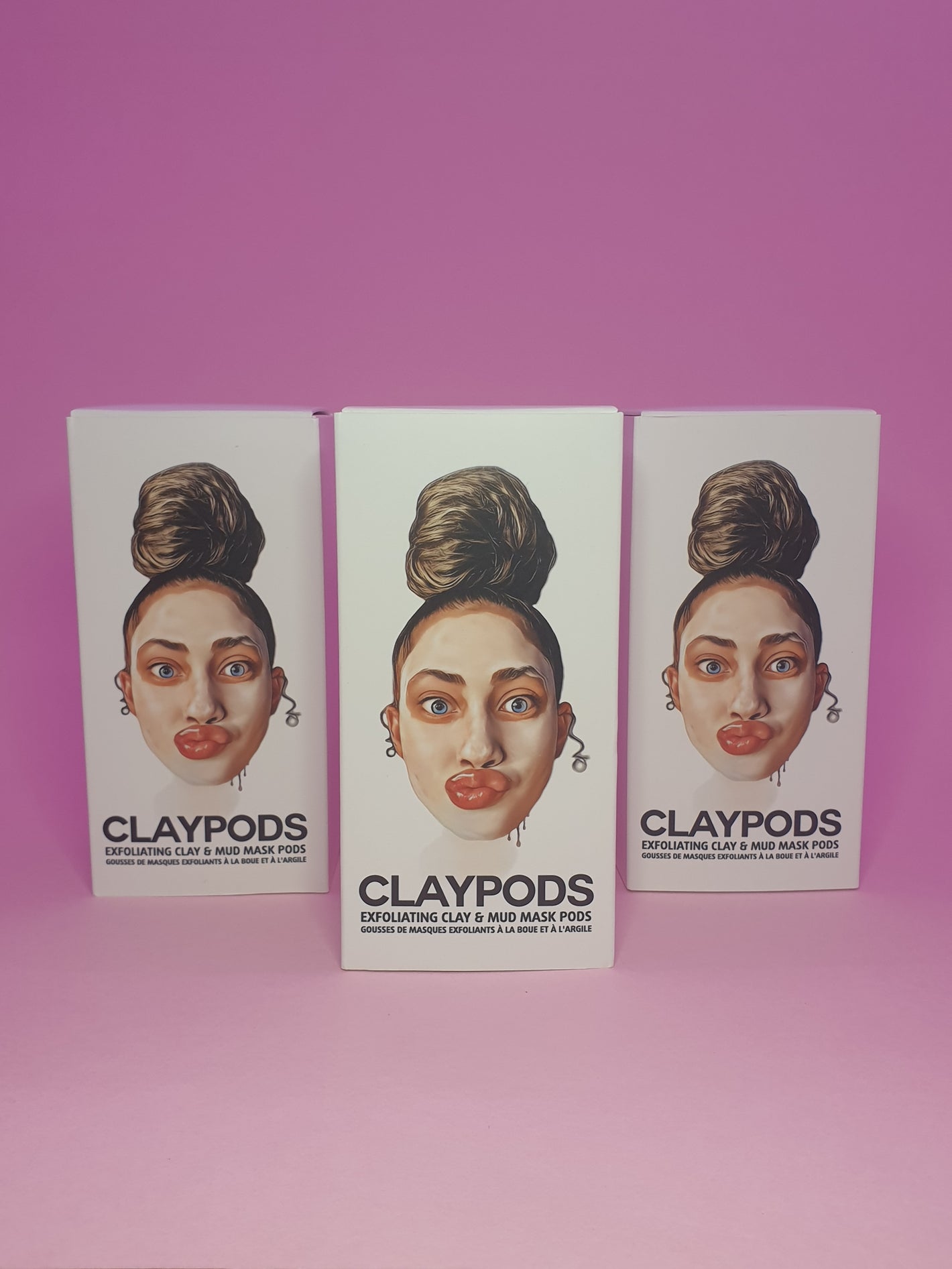 three boxes of clay pods skincare shot