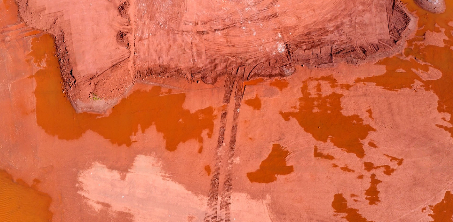 French Red Clay - A photo of a deep red-colored clay that is naturally sourced from regions in France. It is rich in minerals such as iron oxide and is known for its ability to absorb impurities and excess oil from the skin. French Red Clay is commonly used in skincare products for its detoxifying properties and ability to improve skin texture and tone.