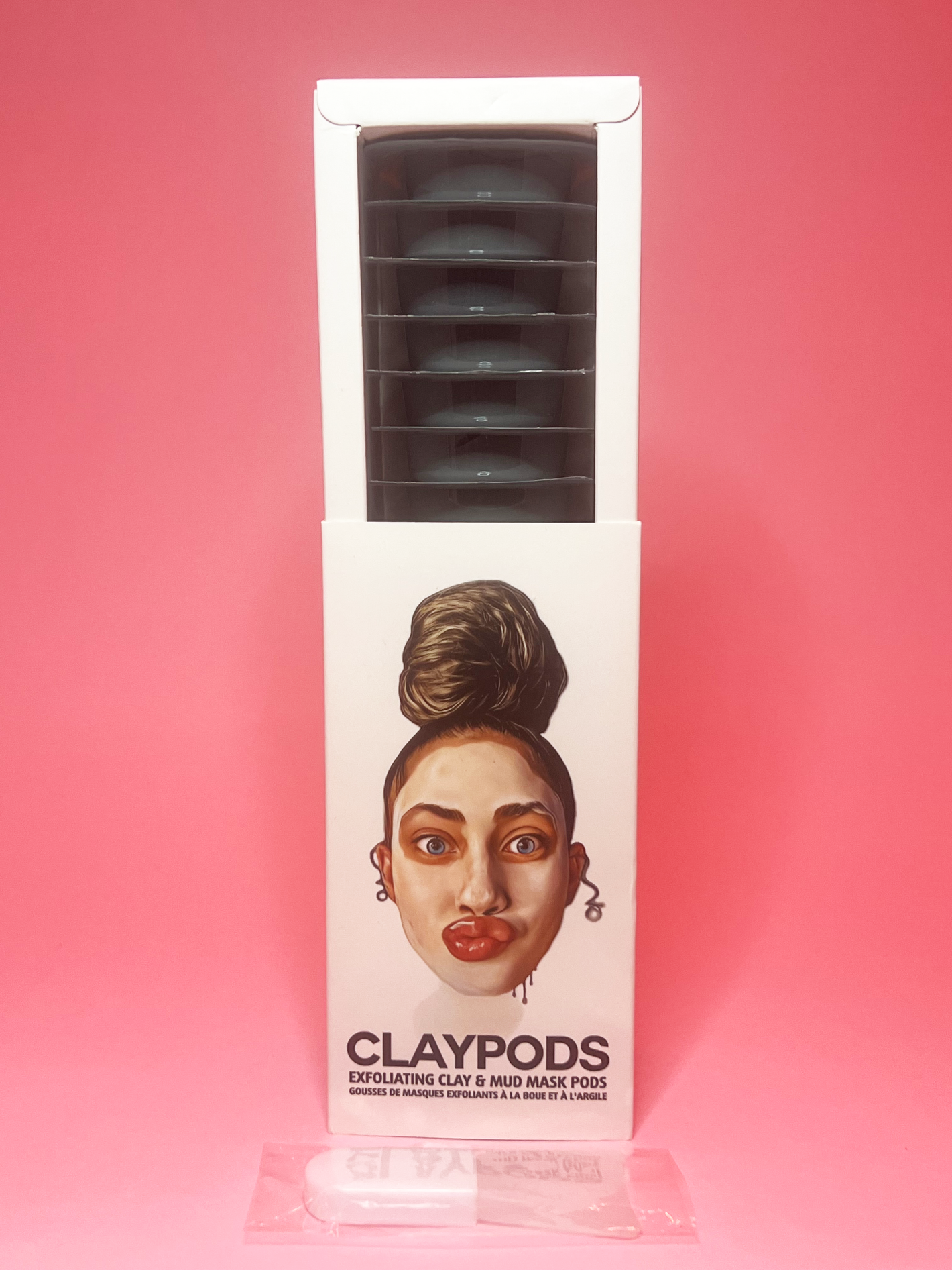 one box of dead sea clay pods with clay mask brush