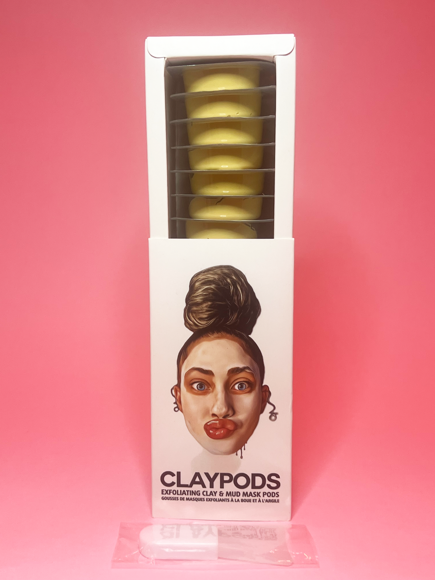 one box of turmeric clay pods with clay mask brush