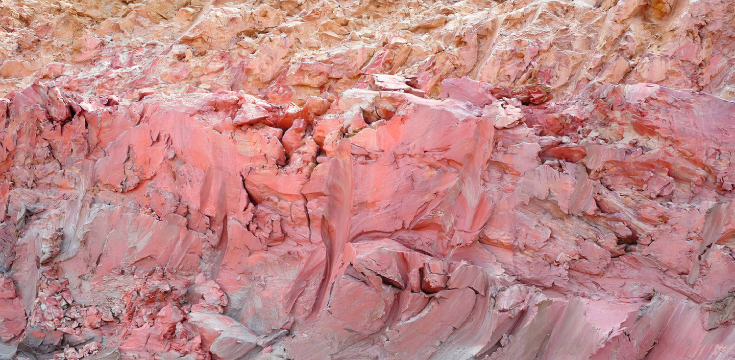 Rose Clay - A photo of a jar filled with fine, dusty pink powder. This is rose clay, a type of cosmetic clay made from naturally occurring kaolinite clay that has a gentle exfoliating effect on the skin. The rose-colored hue comes from the presence of iron oxide and other minerals. Rose clay is commonly used in facial masks, scrubs, and other skincare products to help cleanse and detoxify the skin while also providing a soothing and calming effect.